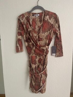 Jennifer Lopez Red and Tan Wrap Dress with Plunge Neckline